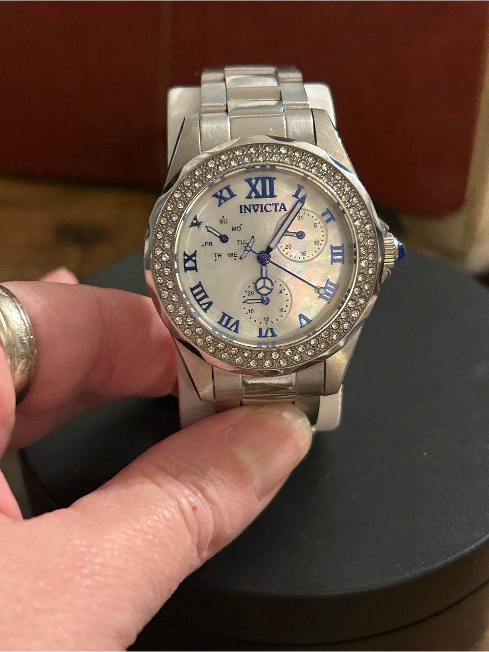 Invicta Silver Watch with Blue Accents and Crystal Bezel